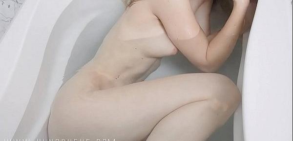  Blonde teen all natural uber Babe in a revealing bathtub photo shoot. What a beauty!